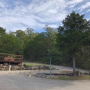 Level gravel RV site with full hook-ups at Branson Shenanigans RV Park