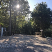 Level gravel RV site with full hook-ups at Branson Shenanigans RV Park