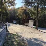 Level gravel RV site with full hook-ups at Branson Shenanigans RV Park