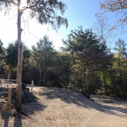 Level gravel RV site with full hook-ups at Branson Shenanigans RV Park