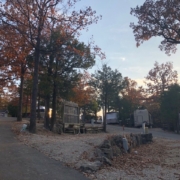 Level gravel RV site with full hook-ups at Branson Shenanigans RV Park