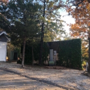 Level gravel RV site with full hook-ups at Branson Shenanigans RV Park