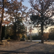 Level gravel RV site with full hook-ups at Branson Shenanigans RV Park