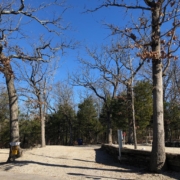 Level gravel RV site with full hook-ups at Branson Shenanigans RV Park