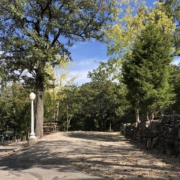 Level gravel RV site with full hook-ups at Branson Shenanigans RV Park